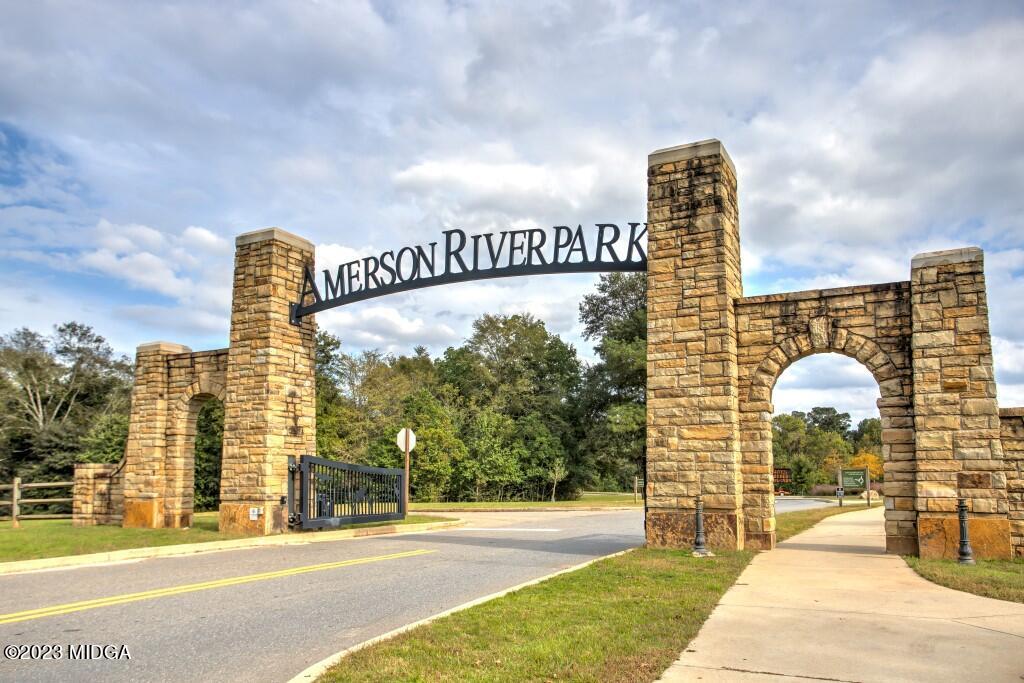 153 Sanders Road Macon, GA 31210 - Photo 6 of 8 a front view of a building with traffic signal lights
