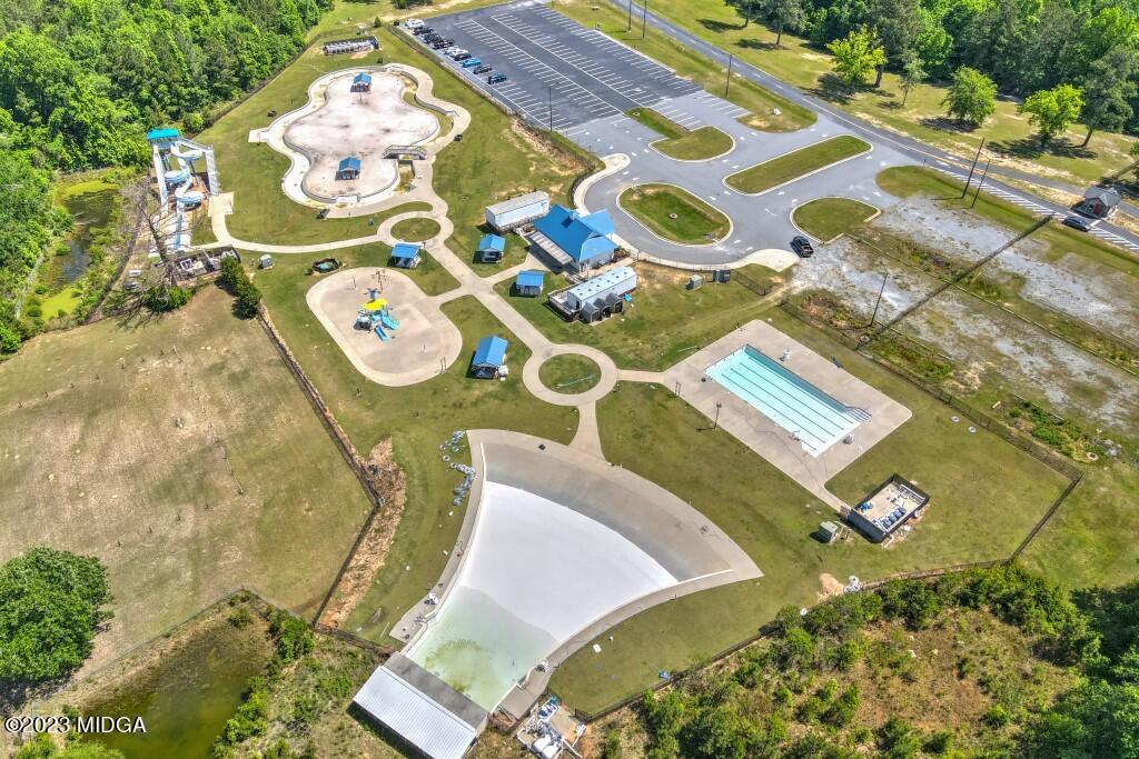 153 Sanders Road Macon, GA 31210 - Photo 8 of 8 an aerial view of a house with a swimming pool