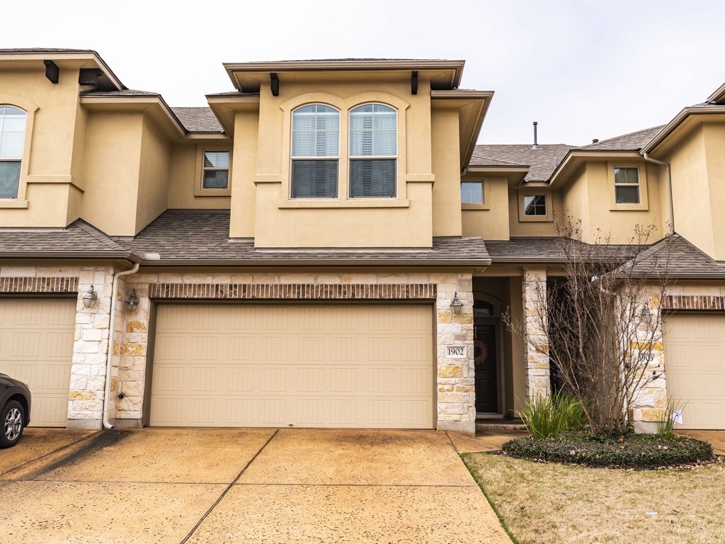14001 Avery Ranch Boulevard, Unit 1902 Austin, TX 78717 - Photo 1 of 20 a front view of a house