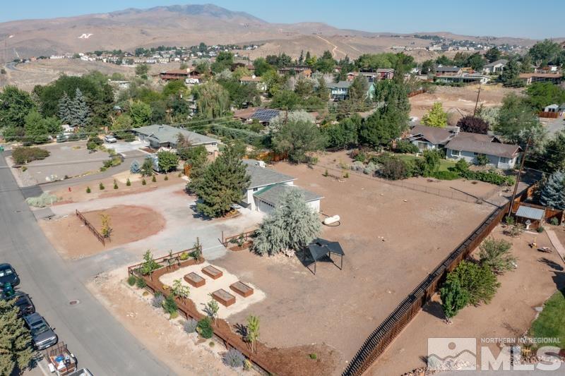175 Greenstone Drive Reno, NV 89512 - Photo 3 of 33 an aerial view of a house with a yard
