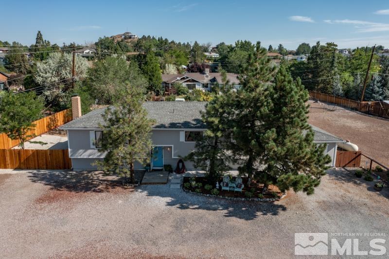 175 Greenstone Drive Reno, NV 89512 - Photo 6 of 33 an outdoor space with lots of trees in the background