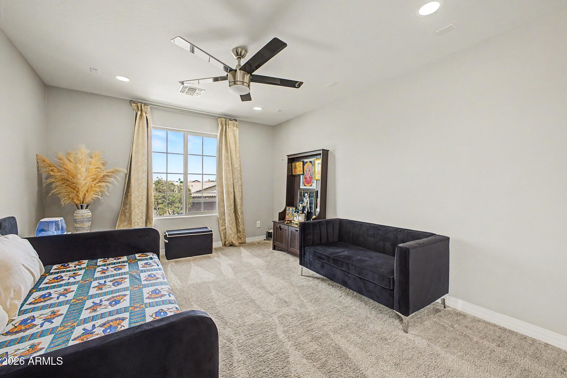 701 East Liberty Lane Gilbert, AZ 85296 - Photo 13 of 46 a living room with furniture and a window