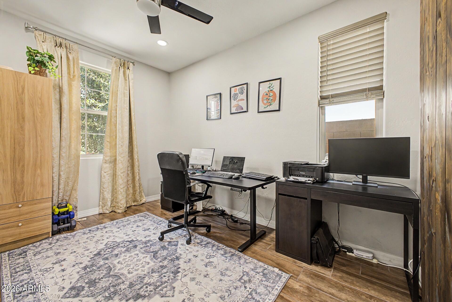 701 East Liberty Lane Gilbert, AZ 85296 - Photo 32 of 46 a view of a workspace with furniture and a window