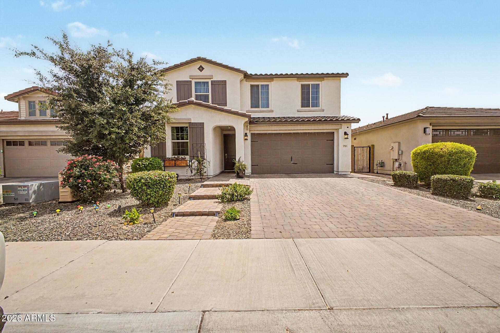 701 East Liberty Lane Gilbert, AZ 85296 - Photo 42 of 46 a front view of a house with a yard