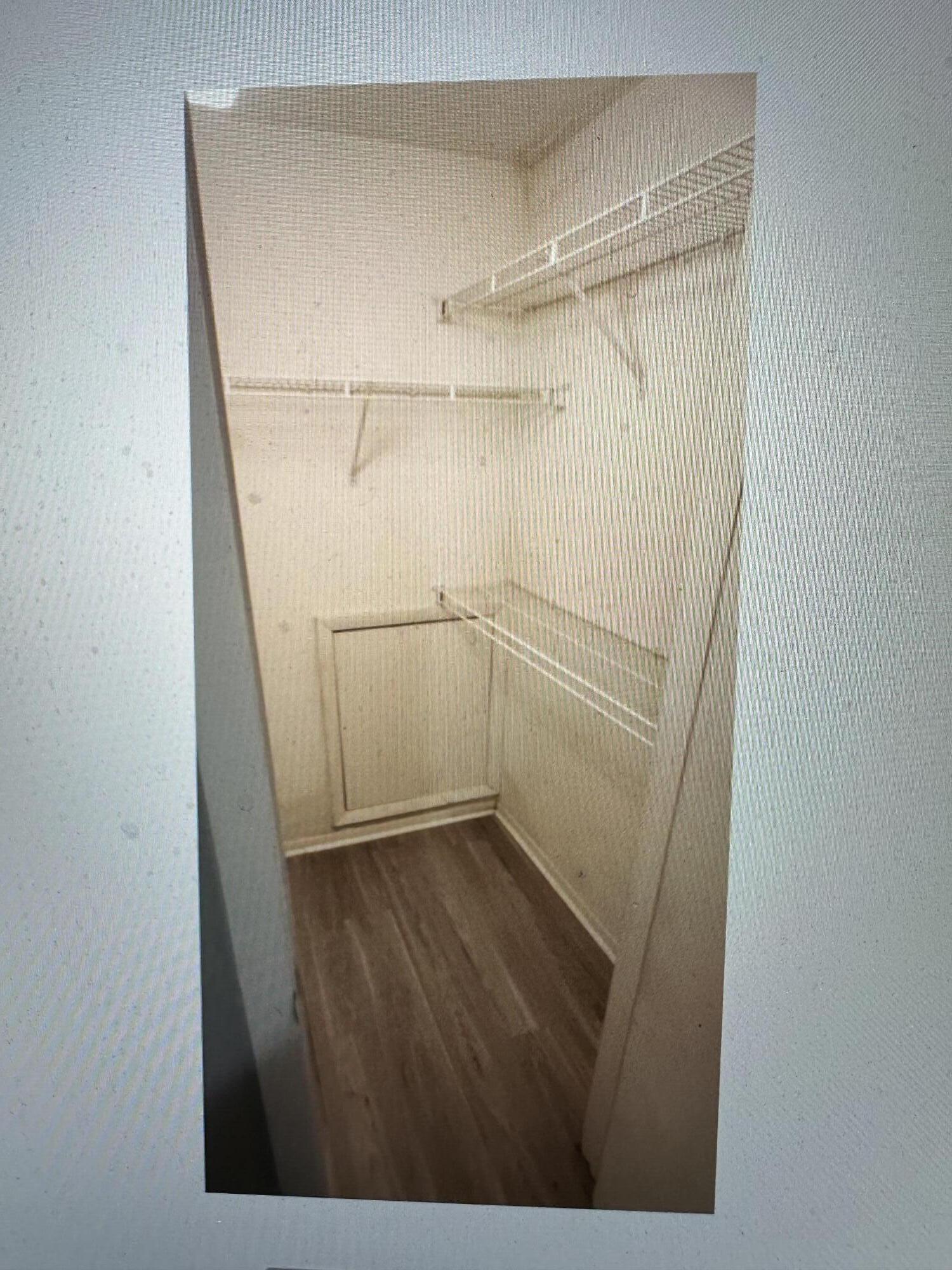 4000 Southwest 23rd Street, Unit 2201 Gainesville, FL 32608 - Photo 8 of 17 a view of walk in closet with empty racks