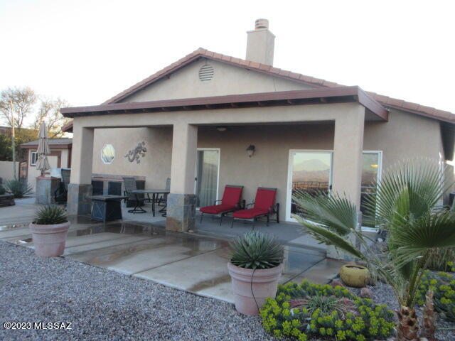 511 Camino Hombre De Oro Rio Rico, AZ 85648 - Photo 3 of 44 a front view of a house with porch