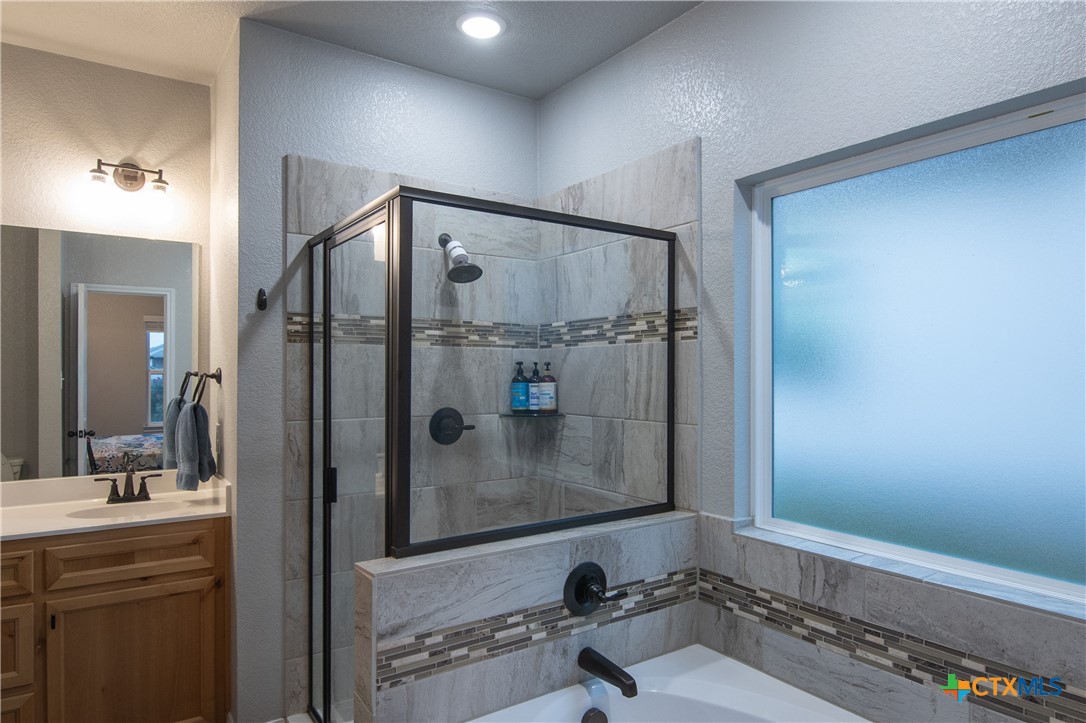 7909 McCulloch Road Temple, TX 76502 - Photo 34 of 46 a bathroom with a shower and a sink