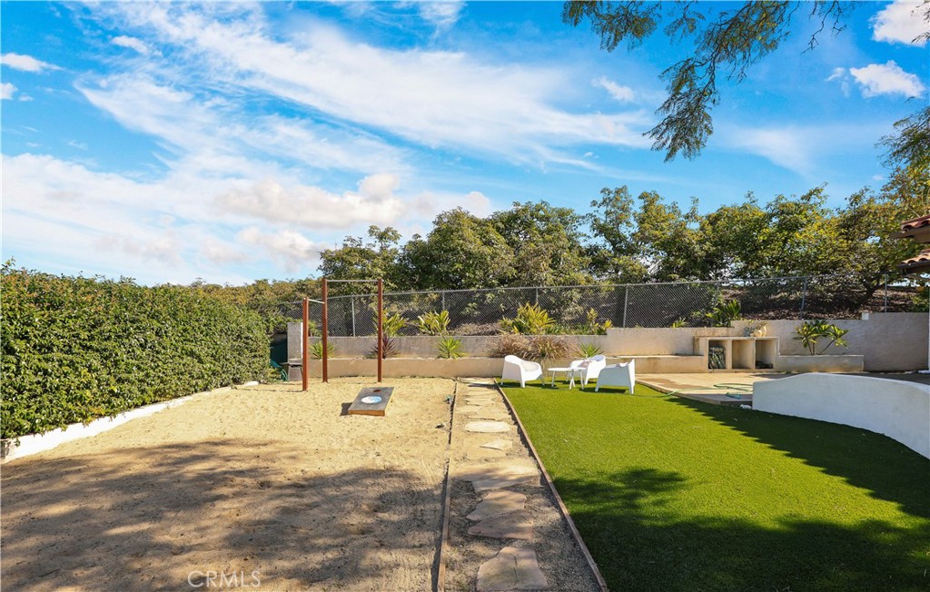 33532 Valle Road San Juan Capistrano, CA 92675 - Photo 18 of 60 a view of a swimming pool with a patio