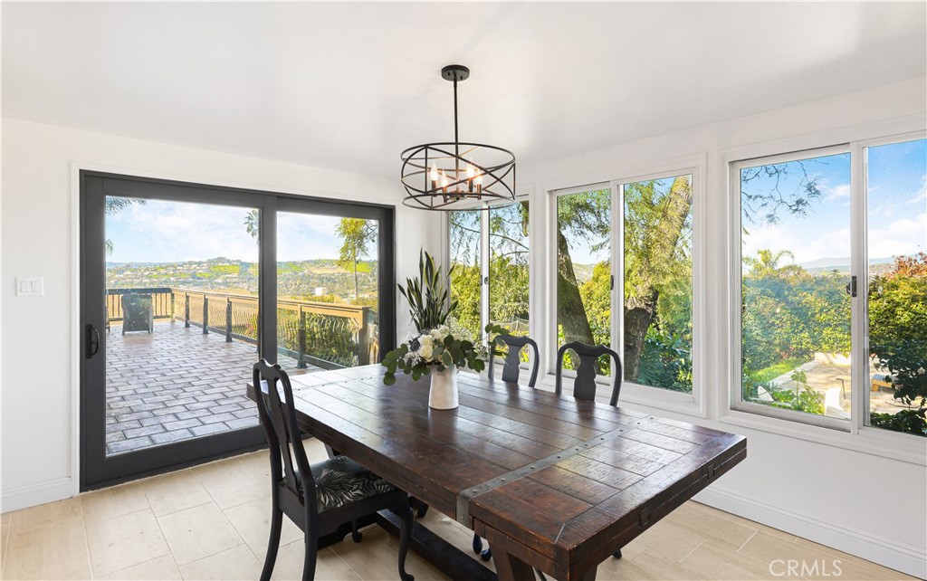 33532 Valle Road San Juan Capistrano, CA 92675 - Photo 34 of 60 a view of a dining room with furniture window and outside view