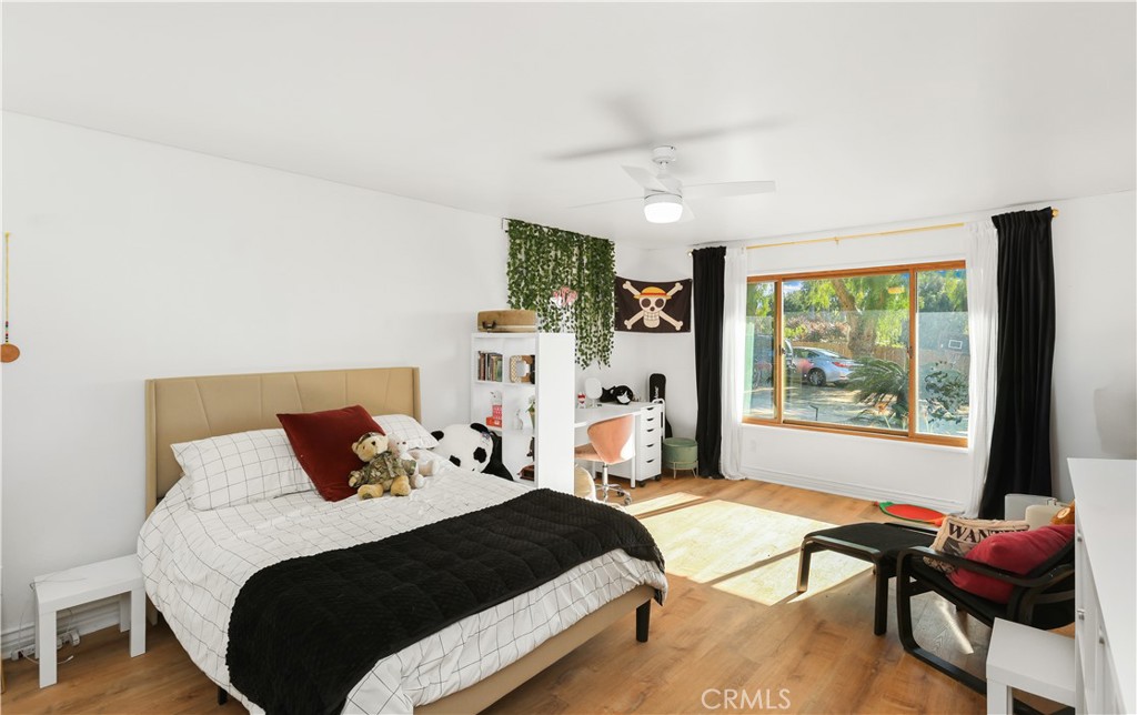 33532 Valle Road San Juan Capistrano, CA 92675 - Photo 42 of 60 a bedroom with a bed and a window