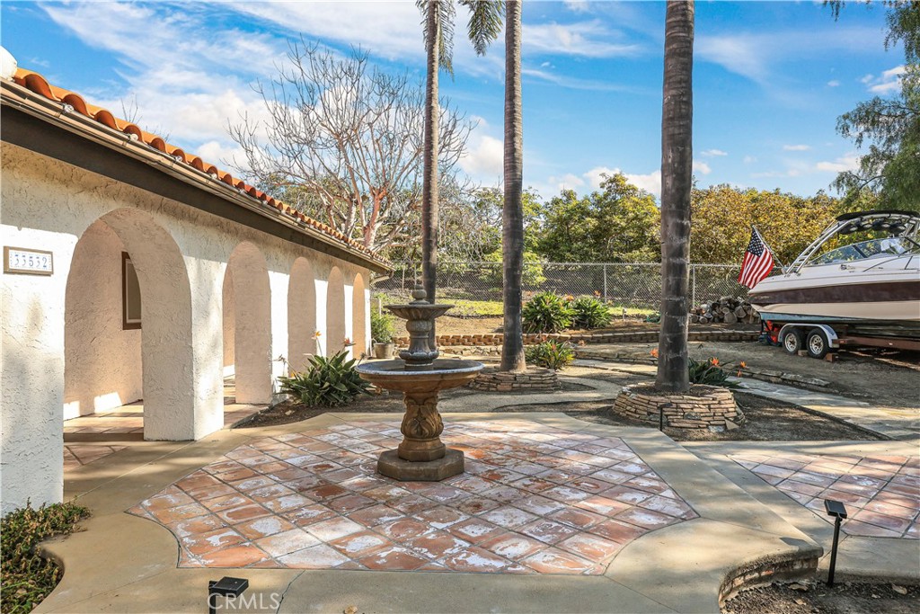 33532 Valle Road San Juan Capistrano, CA 92675 - Photo 10 of 60 a view of a porch with a floor to ceiling window