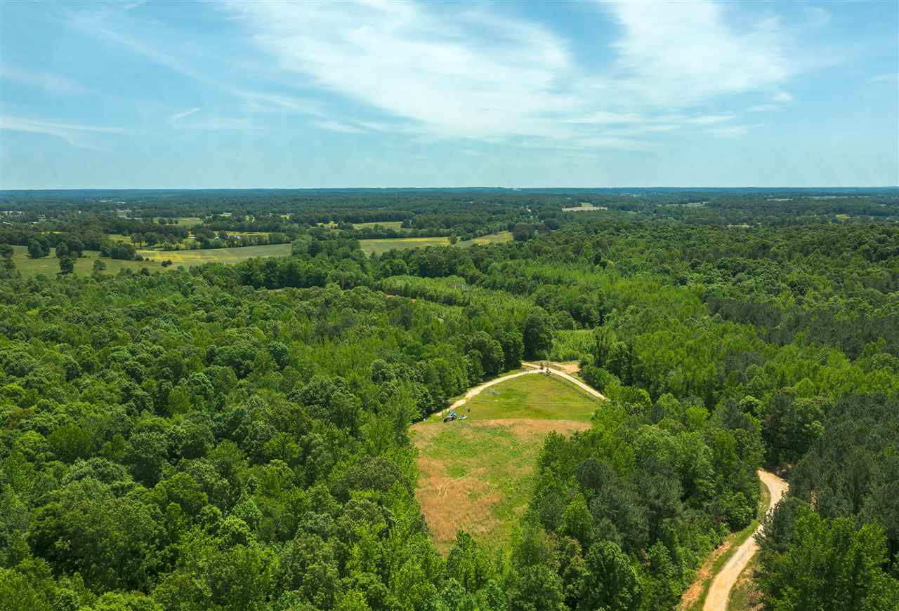 0 Road A Road Cedar Grove, TN 38321 - Photo 6 of 9 an aerial view of a houses with a yard