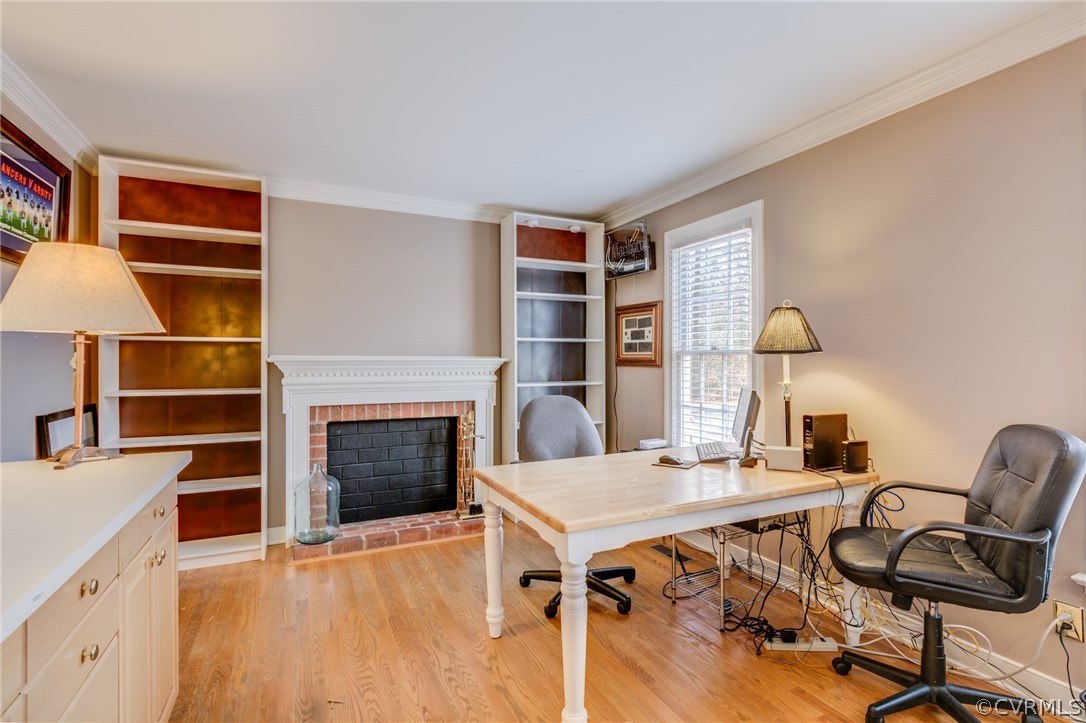 9501 Elkwood Road Midlothian, VA 23112 - Photo 4 of 22 Office is a bright room with built-ins and faux fi