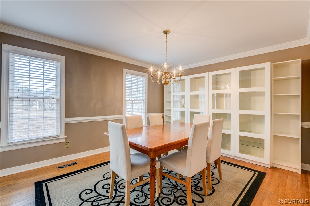9501 Elkwood Road Midlothian, VA 23112 - Photo 5 of 22 This spacious dining room is bright and airy with
