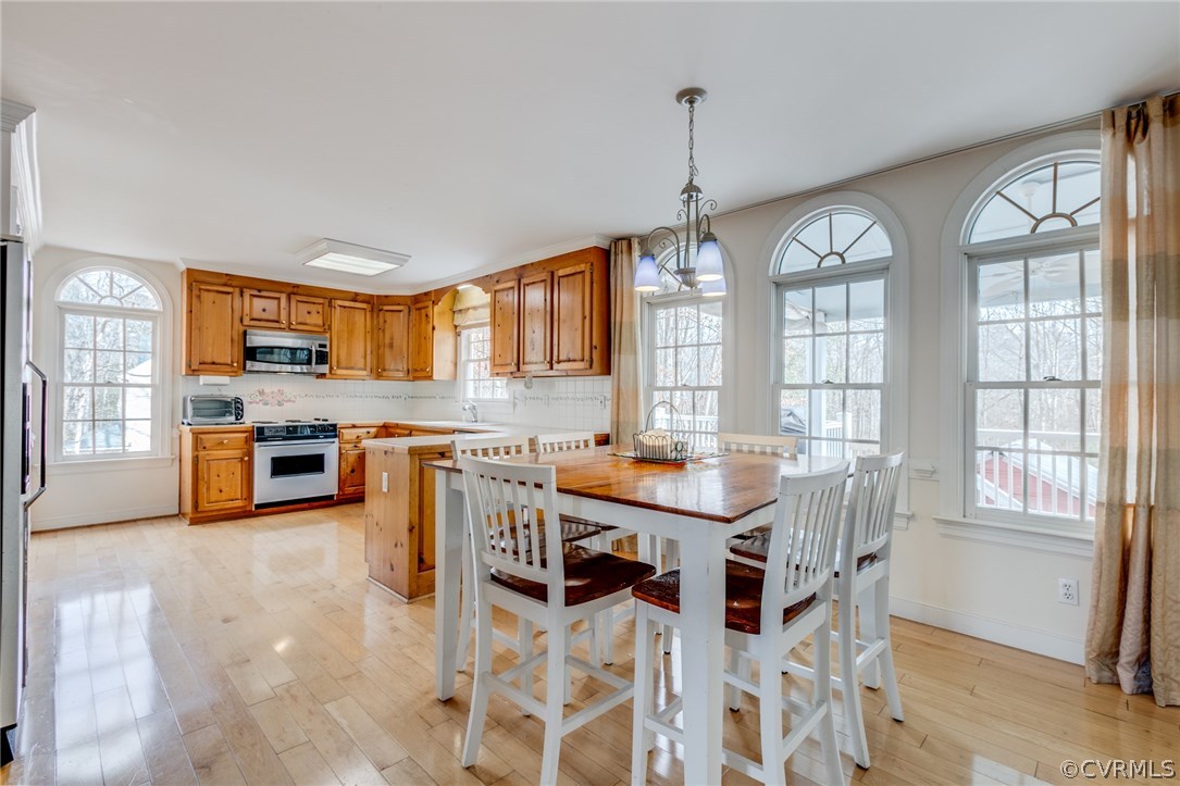 9501 Elkwood Road Midlothian, VA 23112 - Photo 8 of 22 Kitchen with eat-in dining. The formal dining area