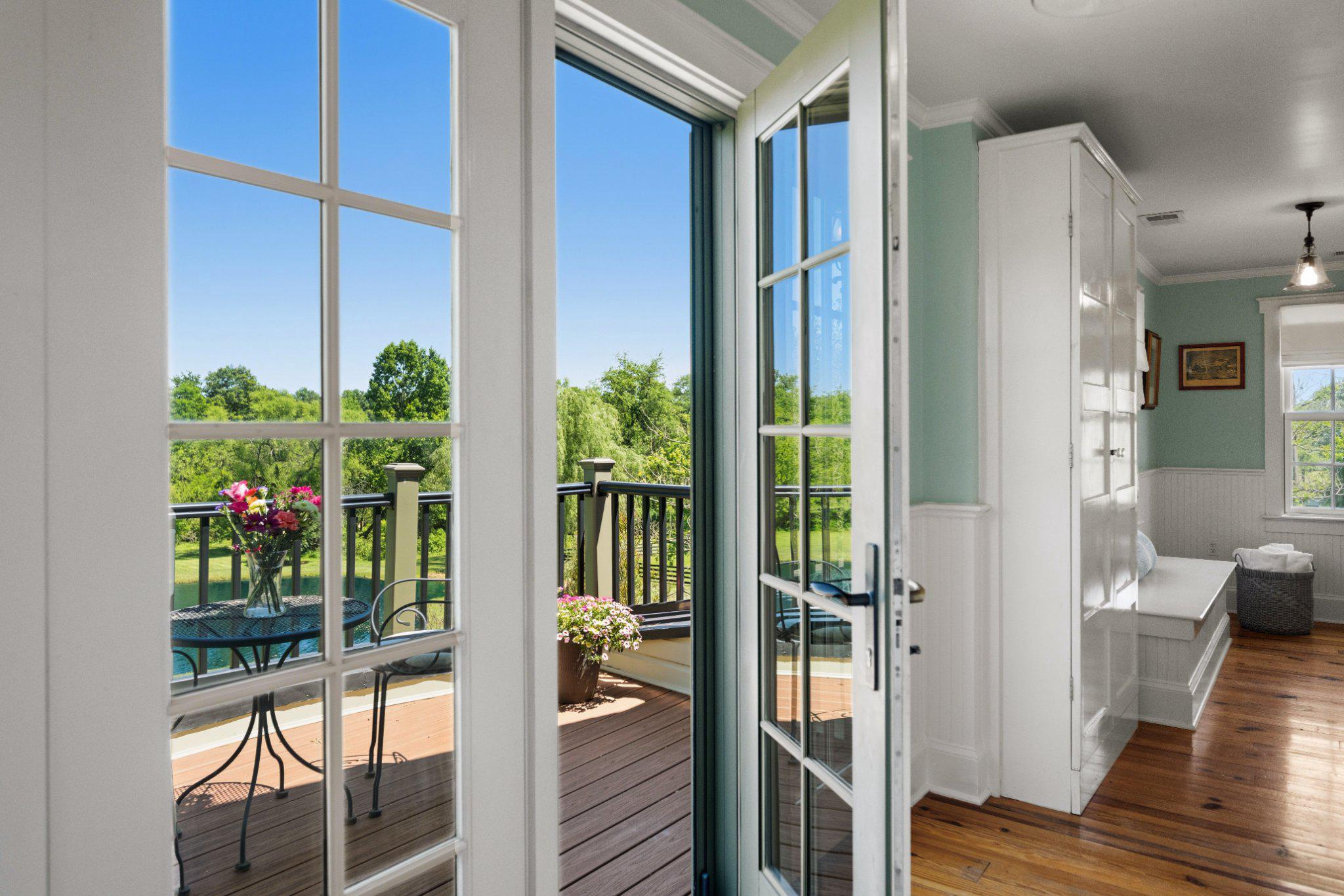 18101 Cattail Road Poolesville, MD 20837 - Photo 49 of 79 French doors open to private deck off bathroom