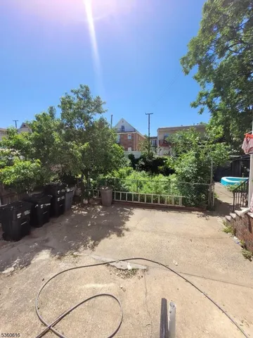 a view of a pathway both side of building