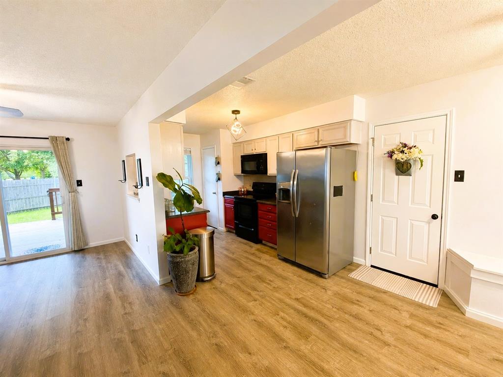 404 Old Mansfield Road Keene, TX 76059 - Photo 7 of 33 Living Area and Kitchen