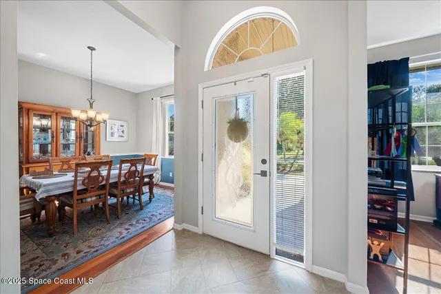 a view of a livingroom with furniture and workspace
