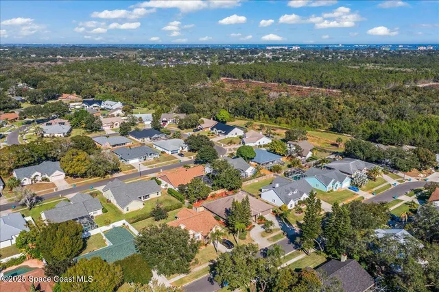 an aerial view of residential building with outdoor space