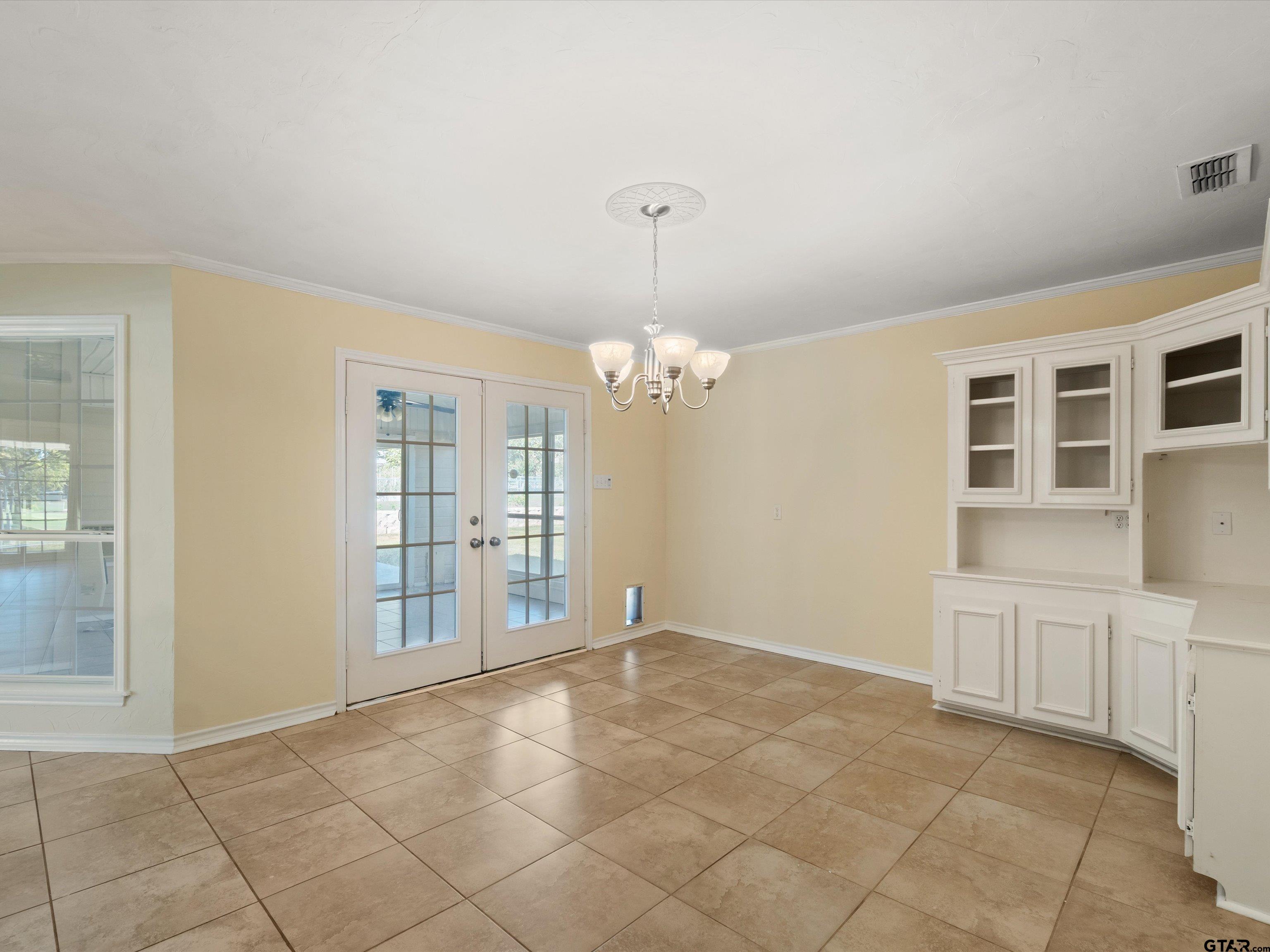 442 Golf Road Gilmer, TX 75645 - Photo 21 of 35 a view of an empty room with a window