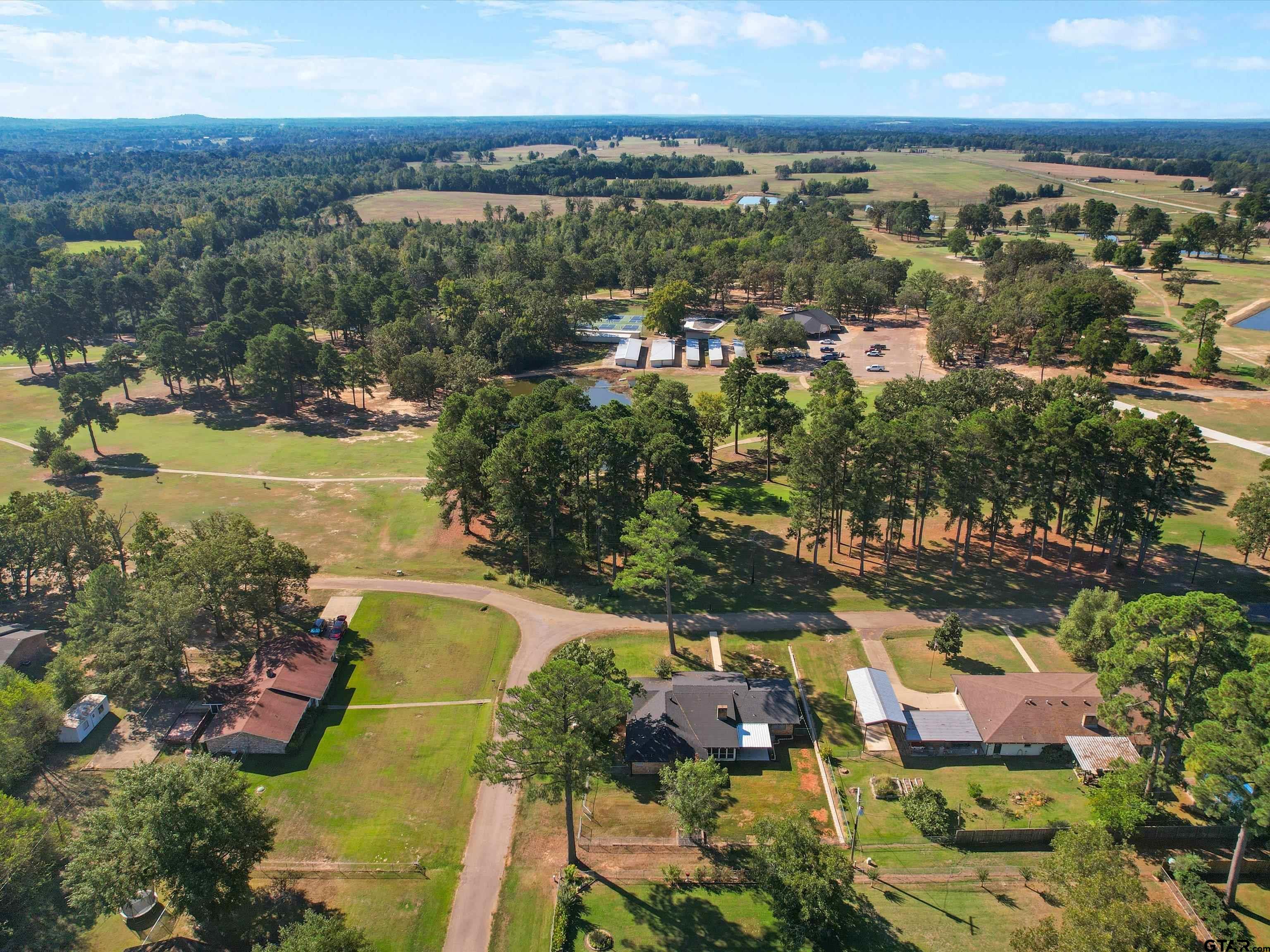 442 Golf Road Gilmer, TX 75645 - Photo 5 of 35 a view of a city with ocean view