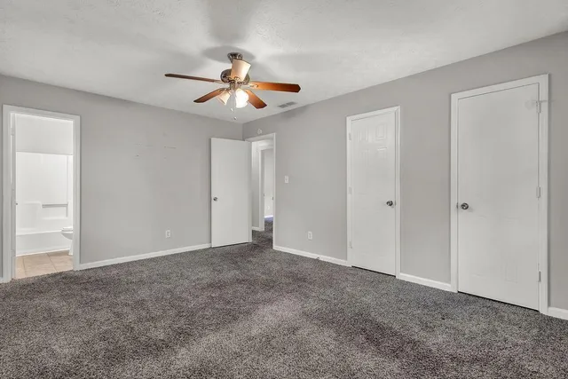 a view of an empty room and window