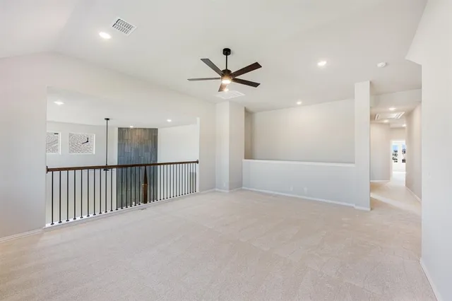 a view of a livingroom with a ceiling fan