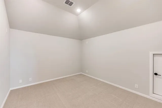 an empty room with a workbench