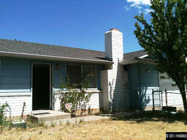 14620 Chamy Drive Reno, NV 89521 - Photo 1 of 1 a front view of a house with a yard