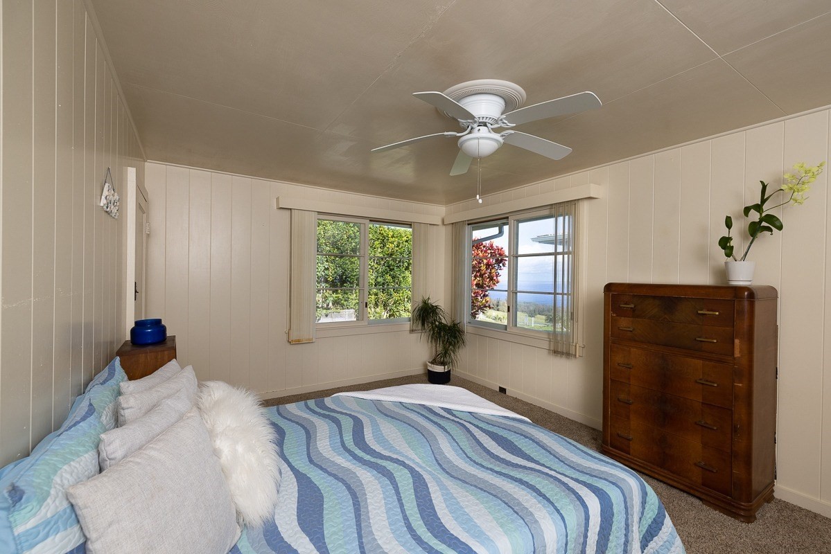 43-342 Pohakea Road Paauilo, HI 96776 - Photo 8 of 18 a bedroom with a bed and a window