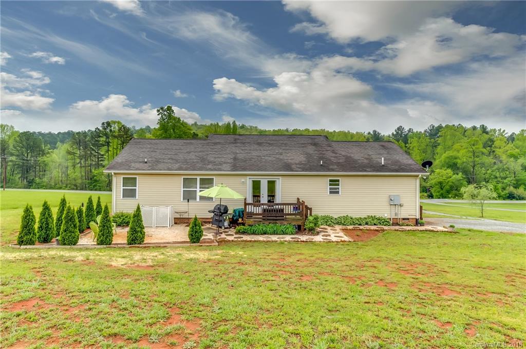 1632 Maple Creek Road Rutherfordton, NC 28139 - Photo 5 of 20 a front view of a house with garden