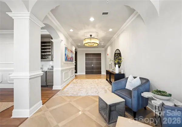 a spacious bedroom with a bed and furniture
