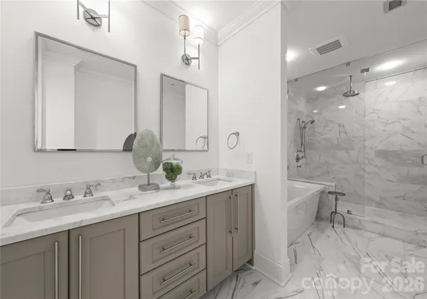 a spacious bathroom with a granite countertop sink mirror and a