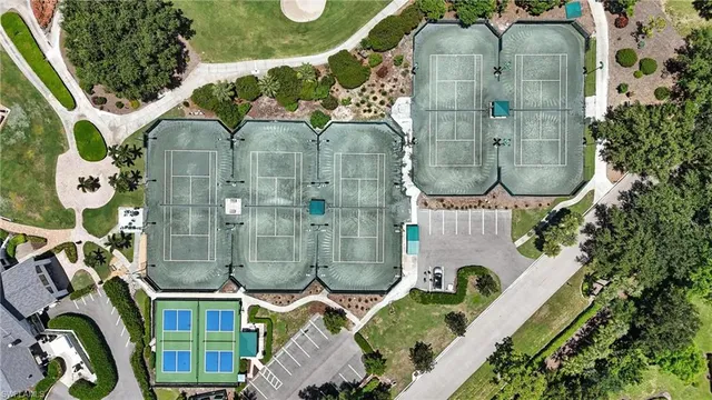 an aerial view of a house with a swimming pool