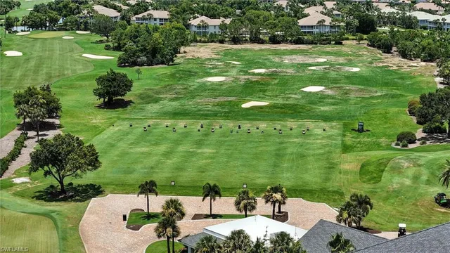 a view of a lake with a yard