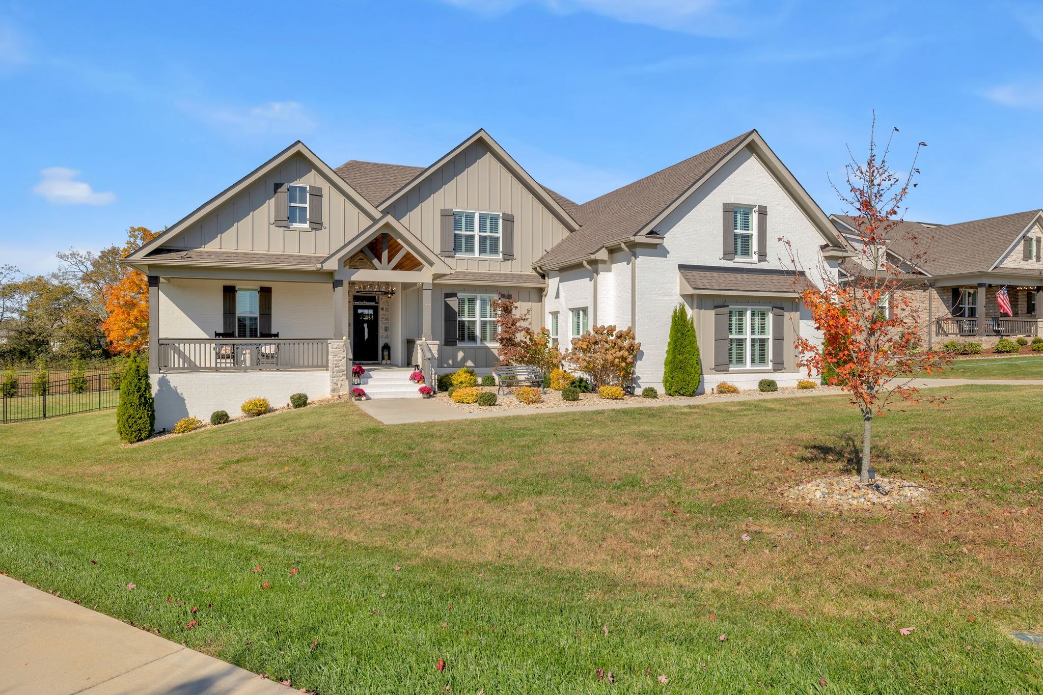1032 Abbey Rd Way Spring Hill, TN 37174 - Photo 2 of 51 a front view of a house with a yard