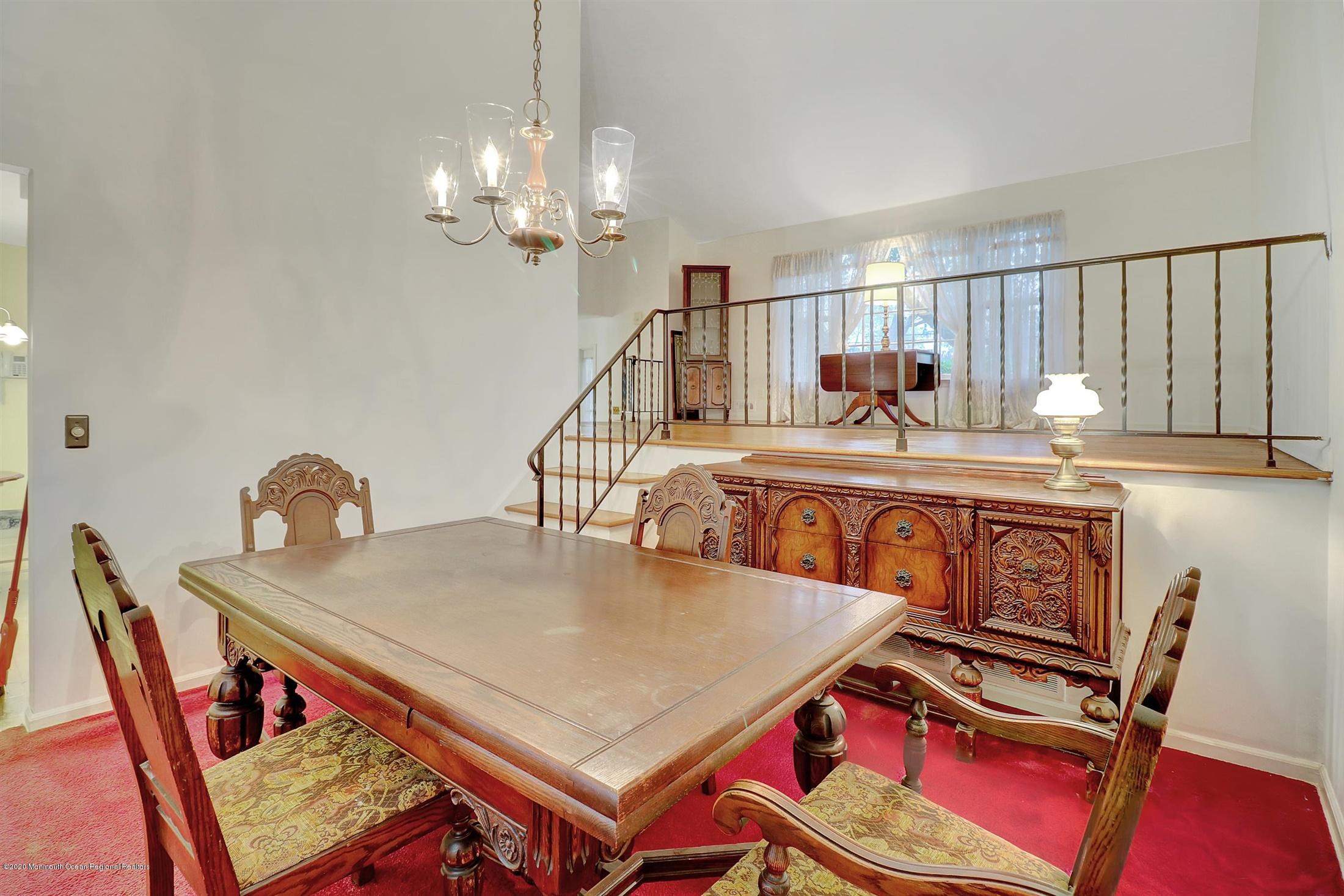 107 Jumping Brook Road Lincroft, NJ 07738 - Photo 12 of 30 a very nice looking dining room with a table and chairs