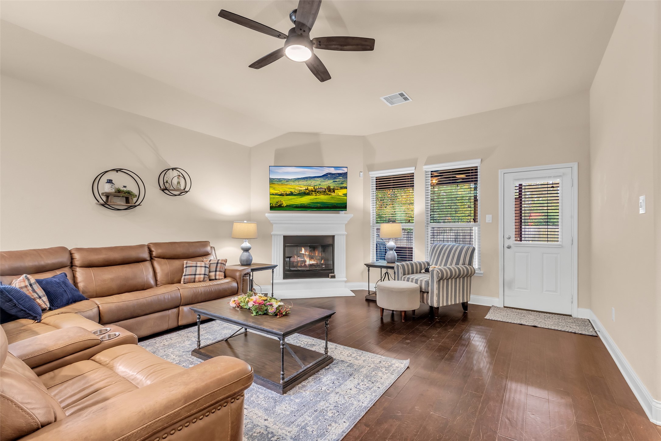 10 Pilot Rock Place Tomball, TX 77375 - Photo 11 of 23 a living room with furniture and a fireplace