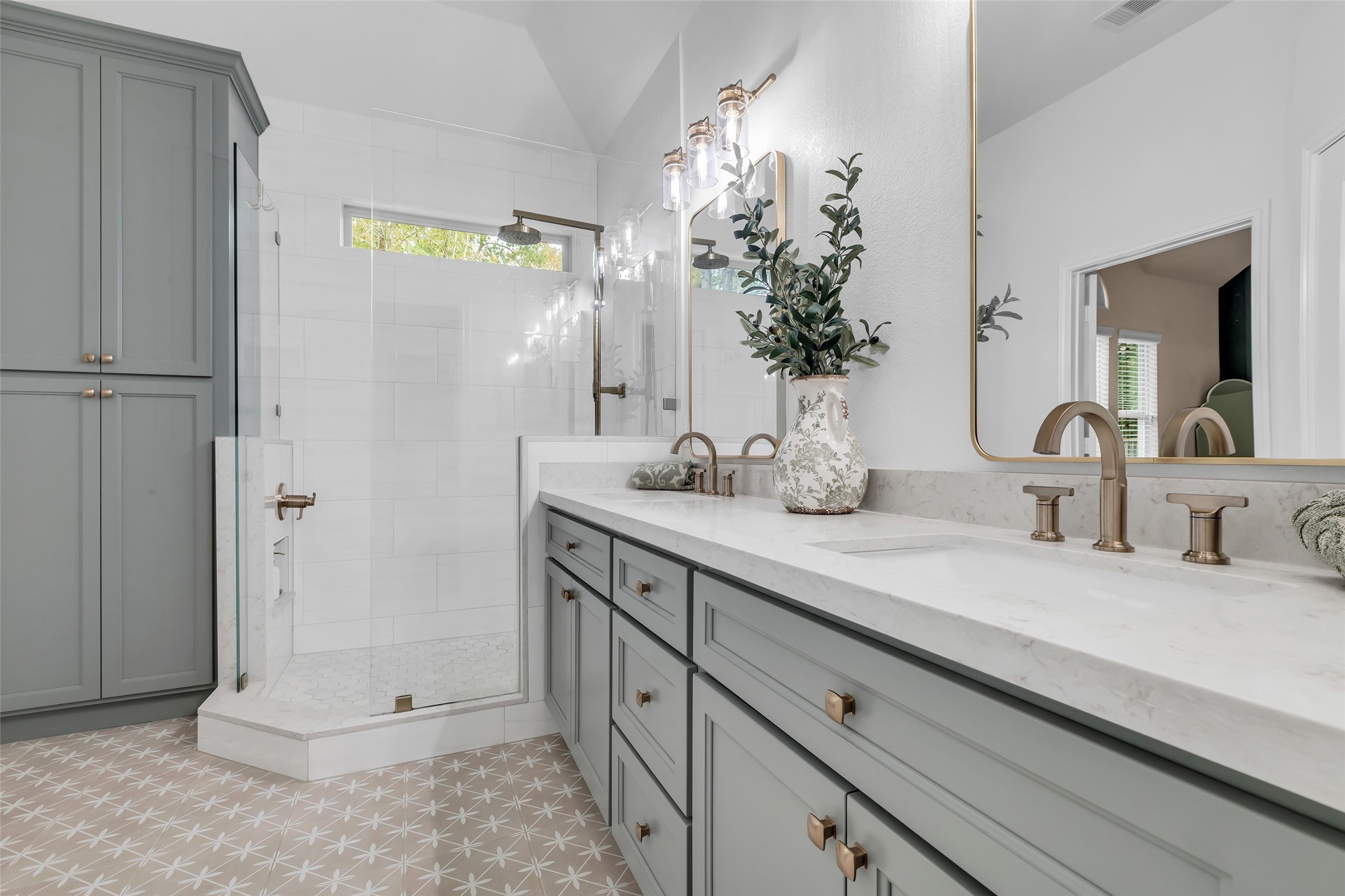10 Pilot Rock Place Tomball, TX 77375 - Photo 15 of 23 a bathroom with a double vanity sink and a mirror