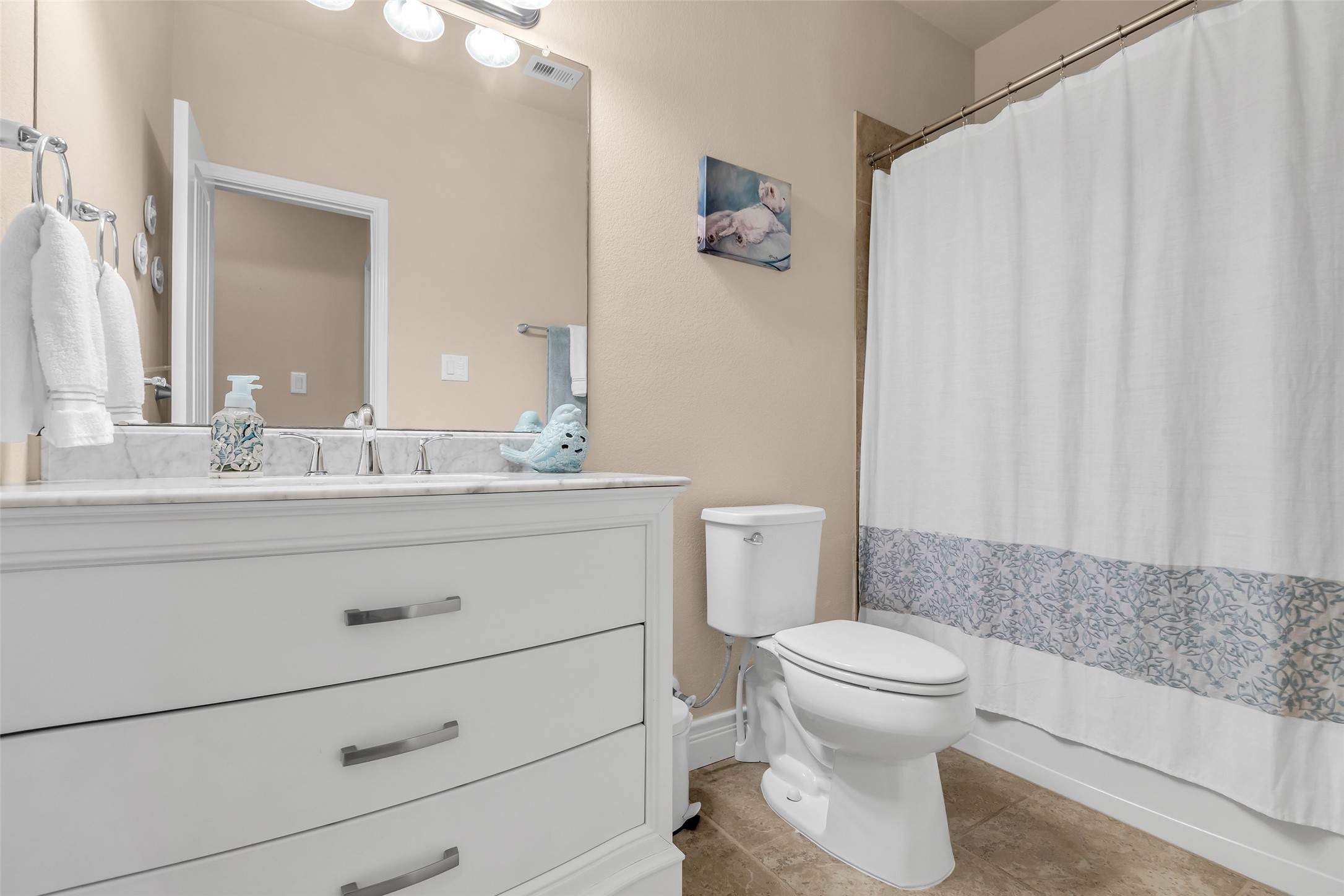 10 Pilot Rock Place Tomball, TX 77375 - Photo 18 of 23 a bathroom with a sink a toilet and a mirror