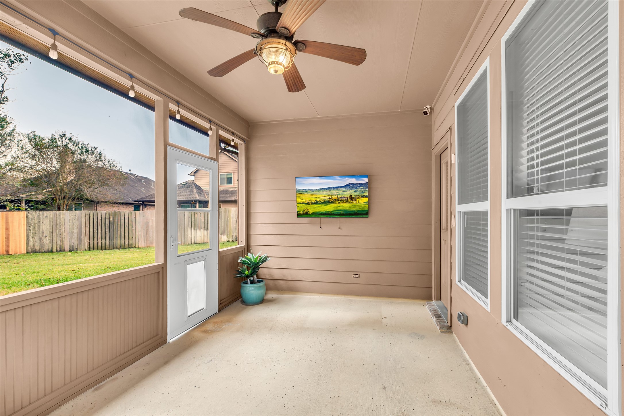 10 Pilot Rock Place Tomball, TX 77375 - Photo 20 of 23 a view of a porch with a table and chairs
