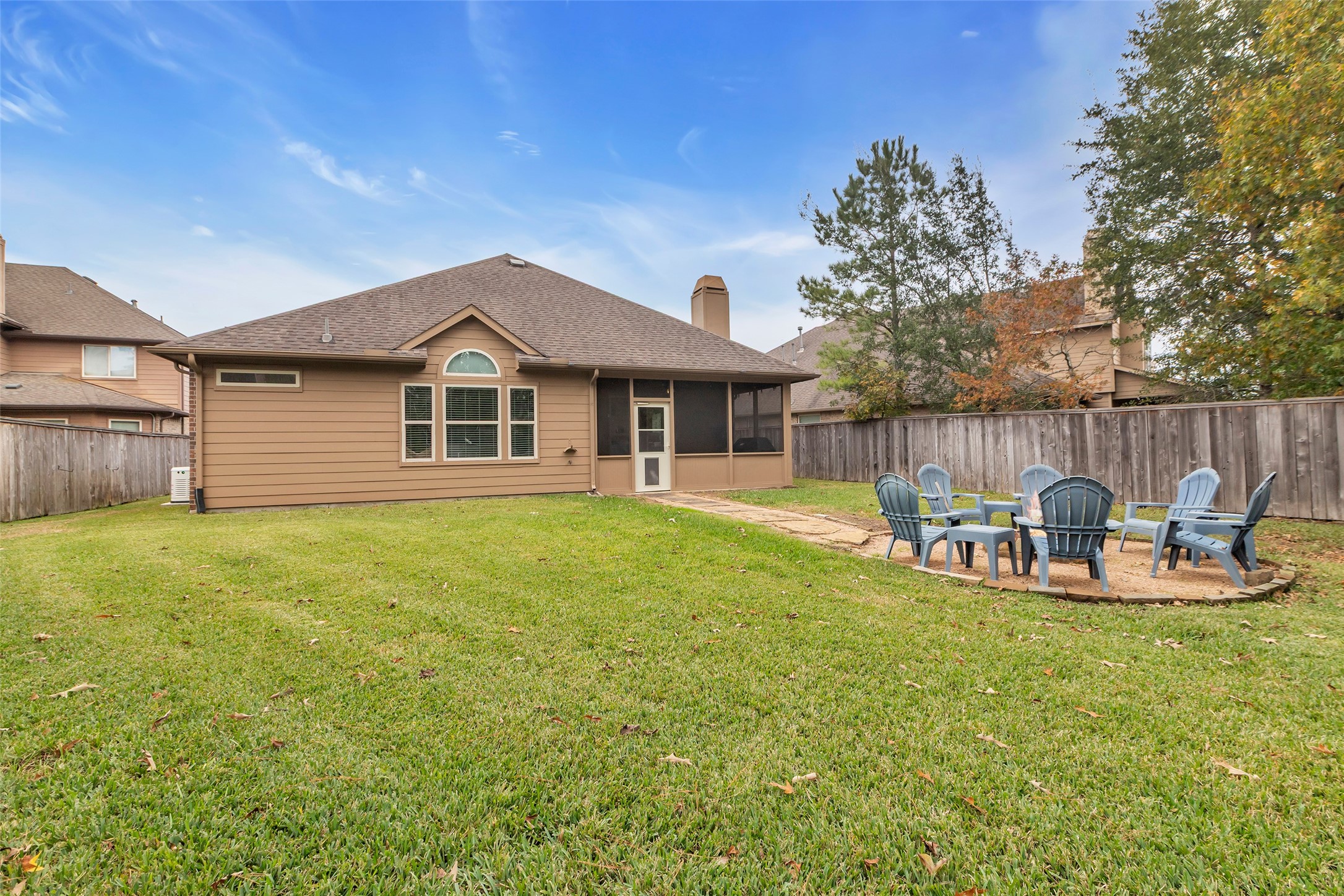 10 Pilot Rock Place Tomball, TX 77375 - Photo 21 of 23 a front view of a house with garden and porch