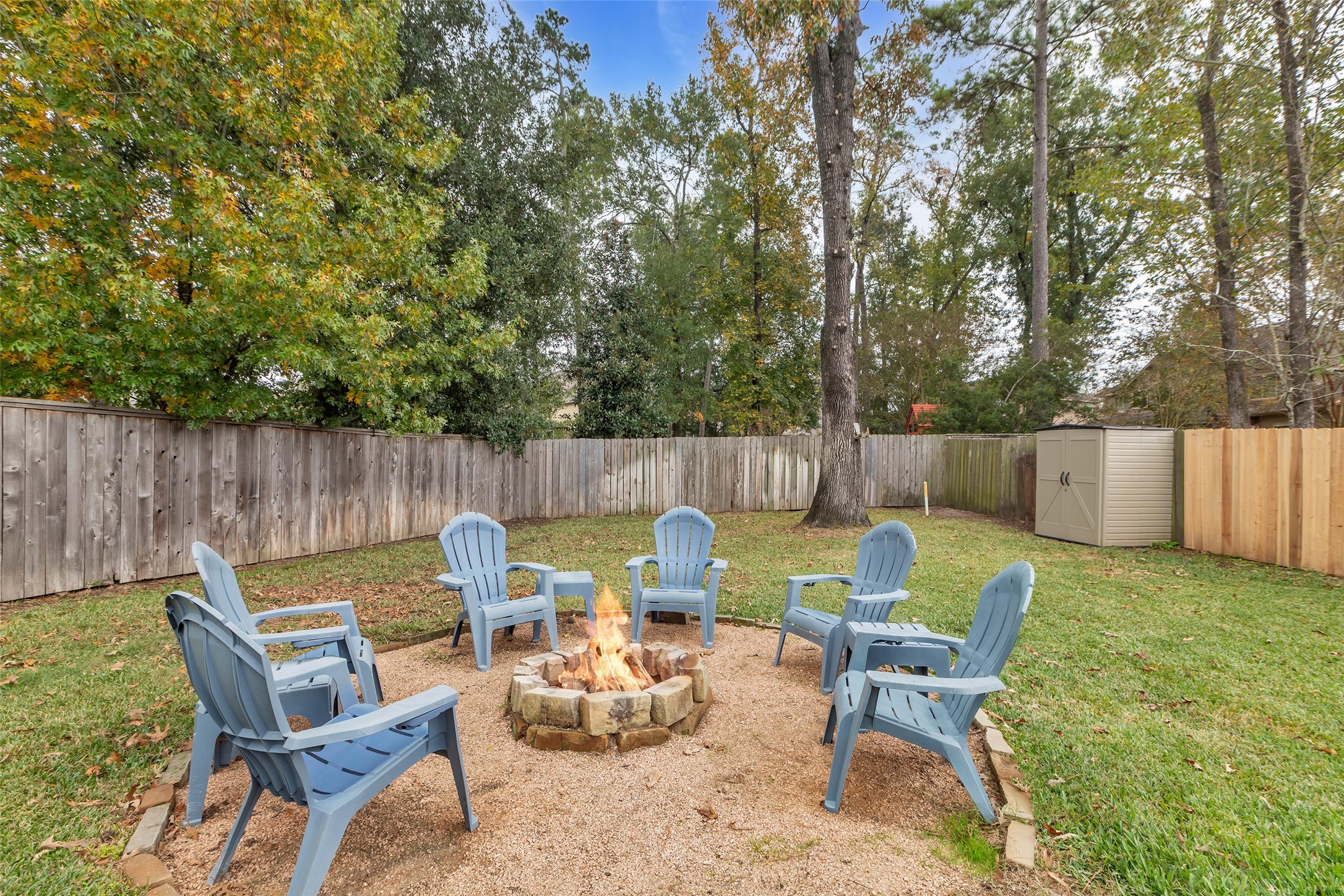 10 Pilot Rock Place Tomball, TX 77375 - Photo 22 of 23 a view of an outdoor sitting area with fire pit