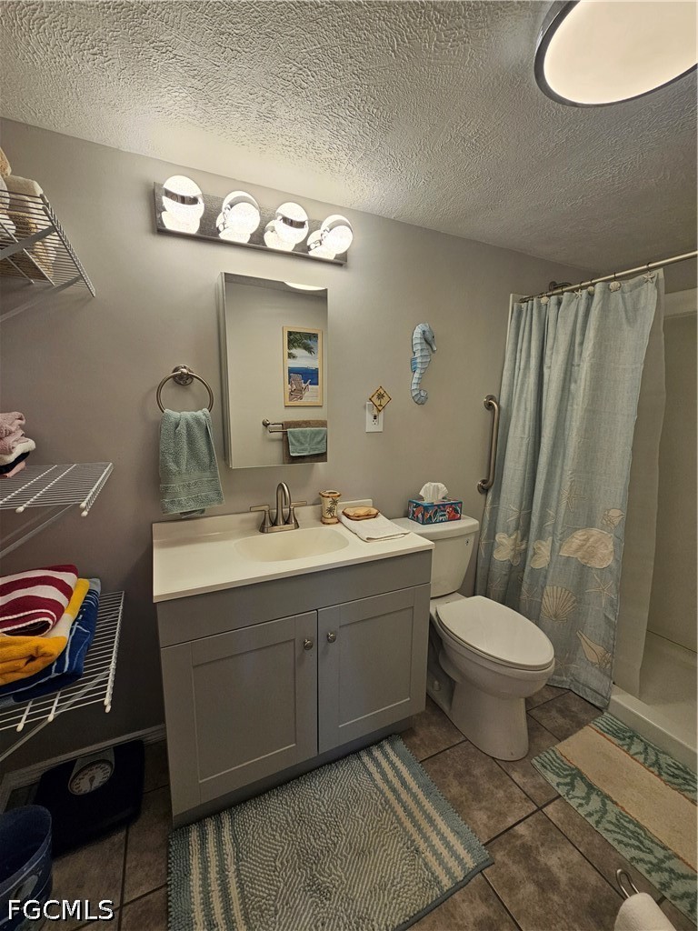 6777 Winkler Road, Unit 168 Fort Myers, FL 33919 - Photo 15 of 15 a bathroom with a sink toilet and shower