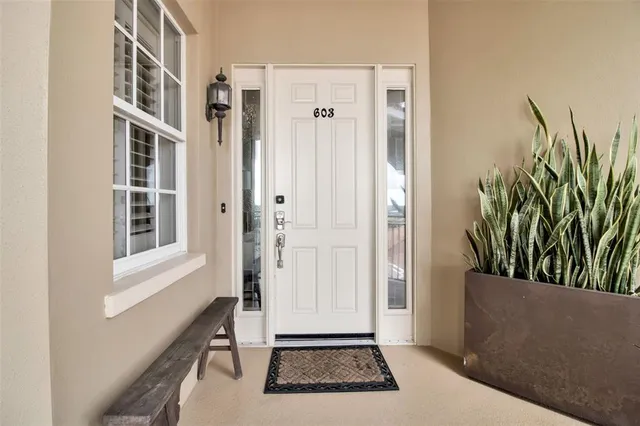 a view of an entryway with a rug