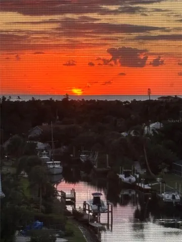 a view of houses with a lake view