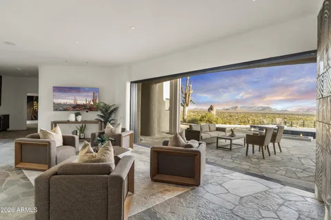 a large kitchen with stainless steel appliances kitchen island granite countertop a large counter top and stove