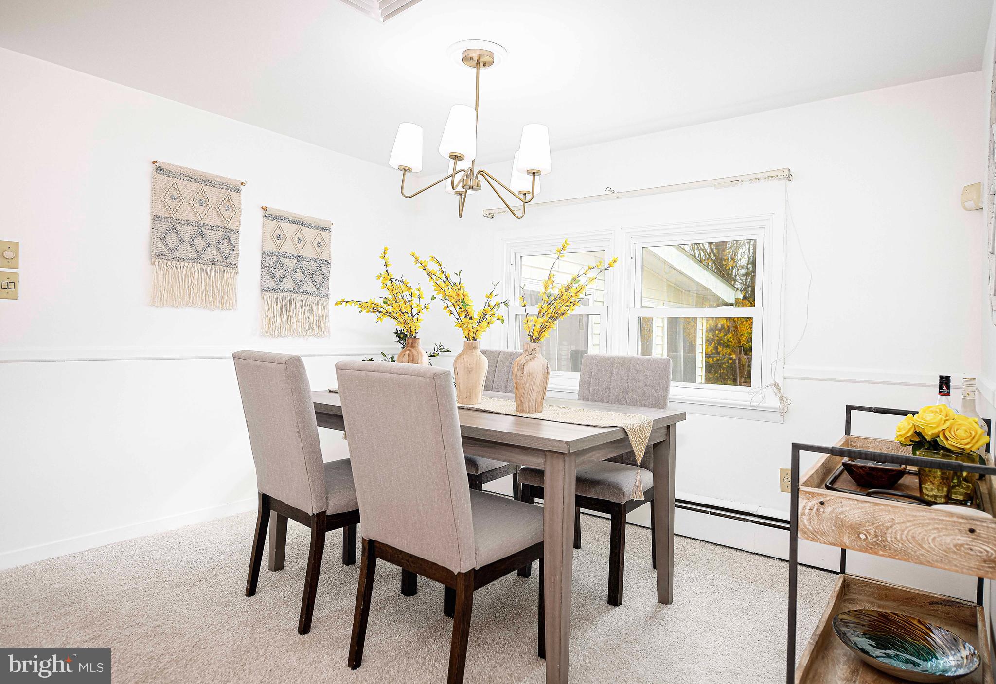 1710 Granite Road Darlington, MD 21034 - Photo 11 of 56 a view of a dining room with furniture and chandelier