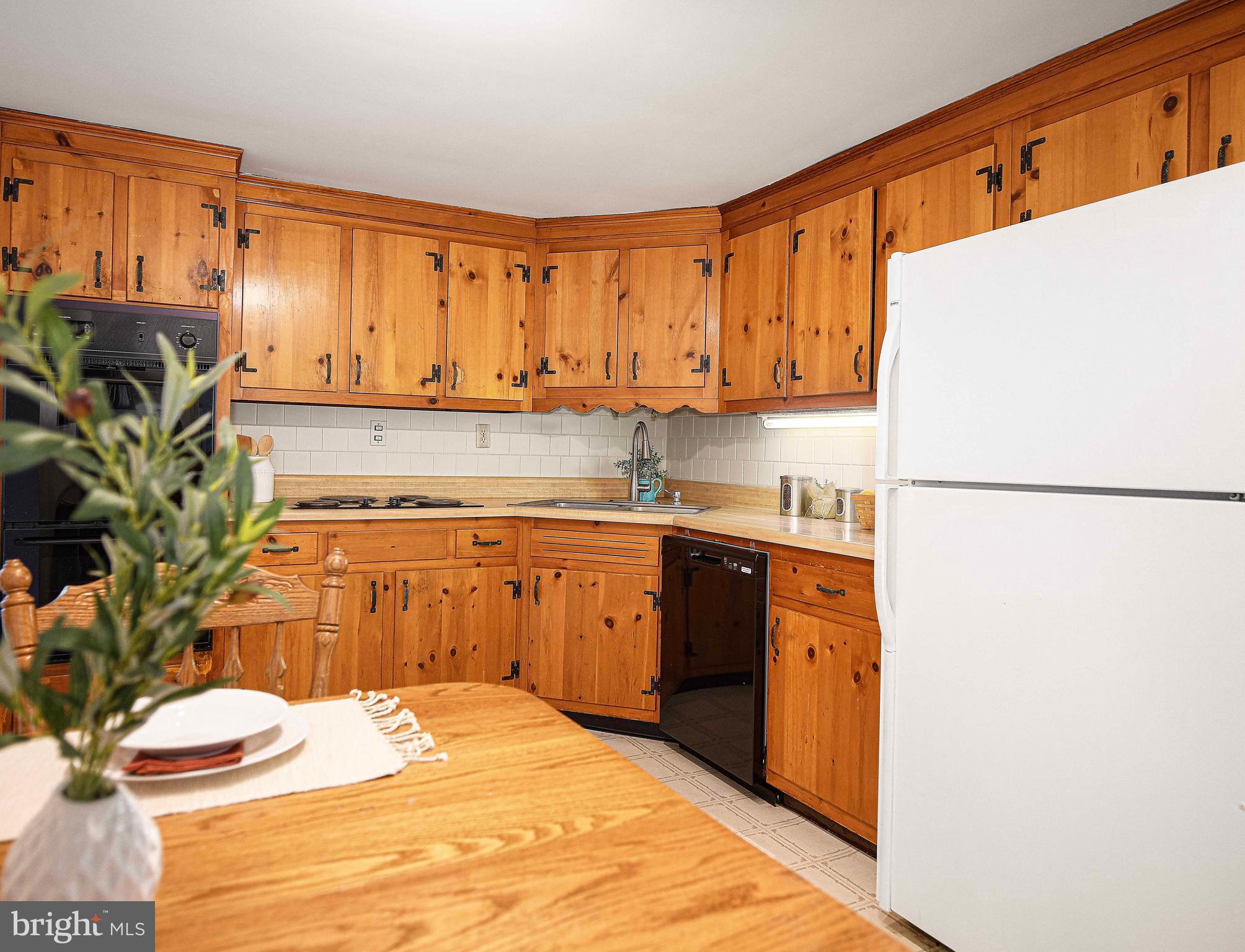 1710 Granite Road Darlington, MD 21034 - Photo 14 of 56 a kitchen with stainless steel appliances granite countertop a refrigerator sink and cabinets